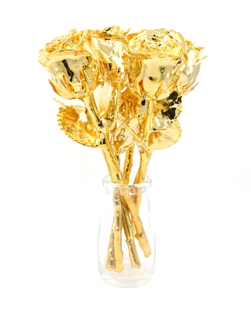 Half dozen gold covered roses in vase