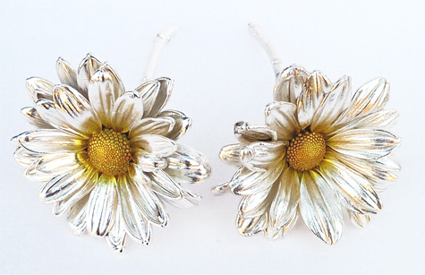Silver covered real daisies