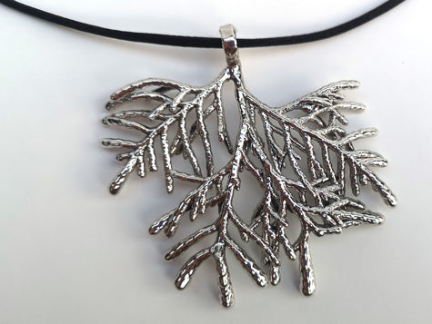 necklace pendant of real coral preserved and coated silver