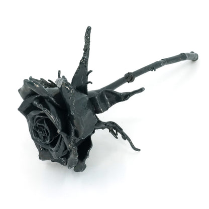 real rose preserved and coated with iron