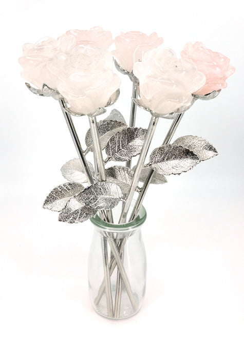 half dozen rose quartz flowers in vase
