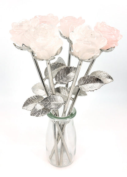 half dozen rose quartz flowers in vase