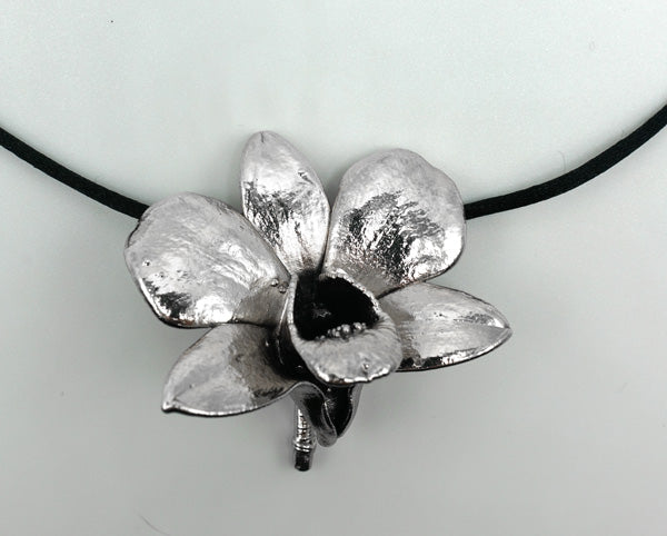 real orchid bloom silver coated to preserve as pendant