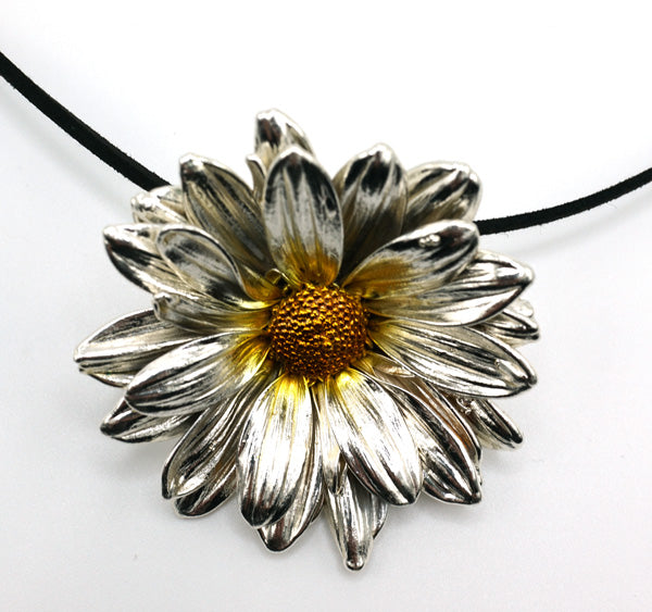 real daisy preserved with silver coating as pendant