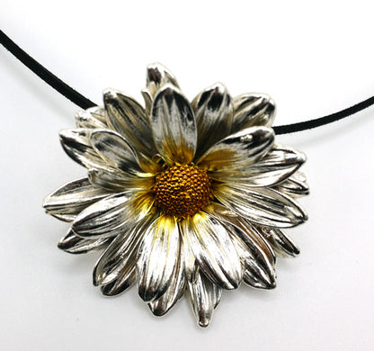 real daisy preserved with silver coating as pendant