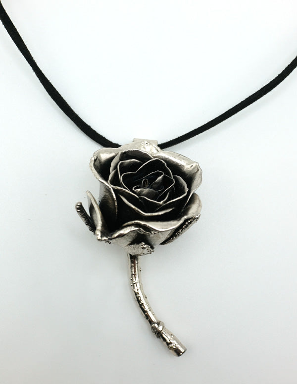 real rose preserved in silver as pendant