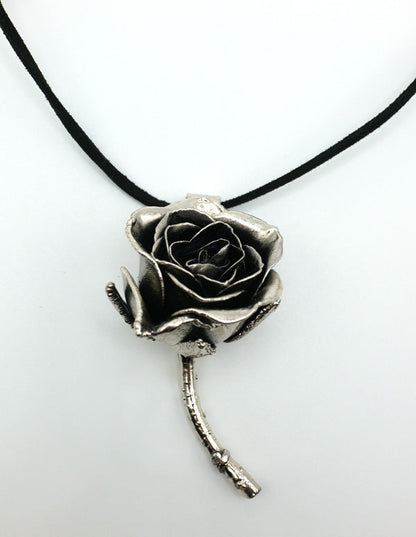 real rose preserved in silver as pendant