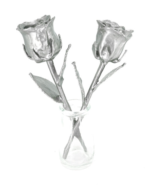 pair of stainless steel covered real roses in vase