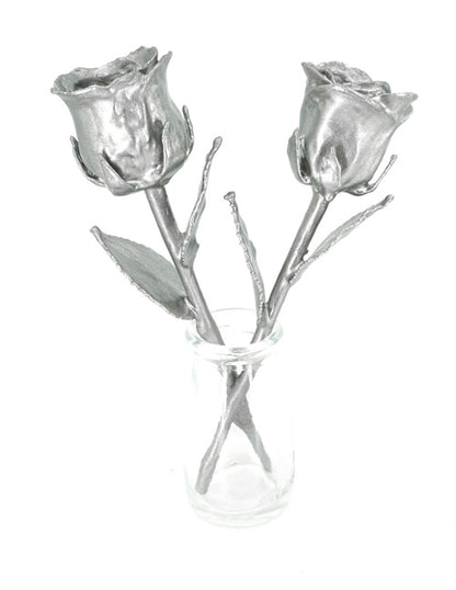 pair of stainless steel covered real roses in vase